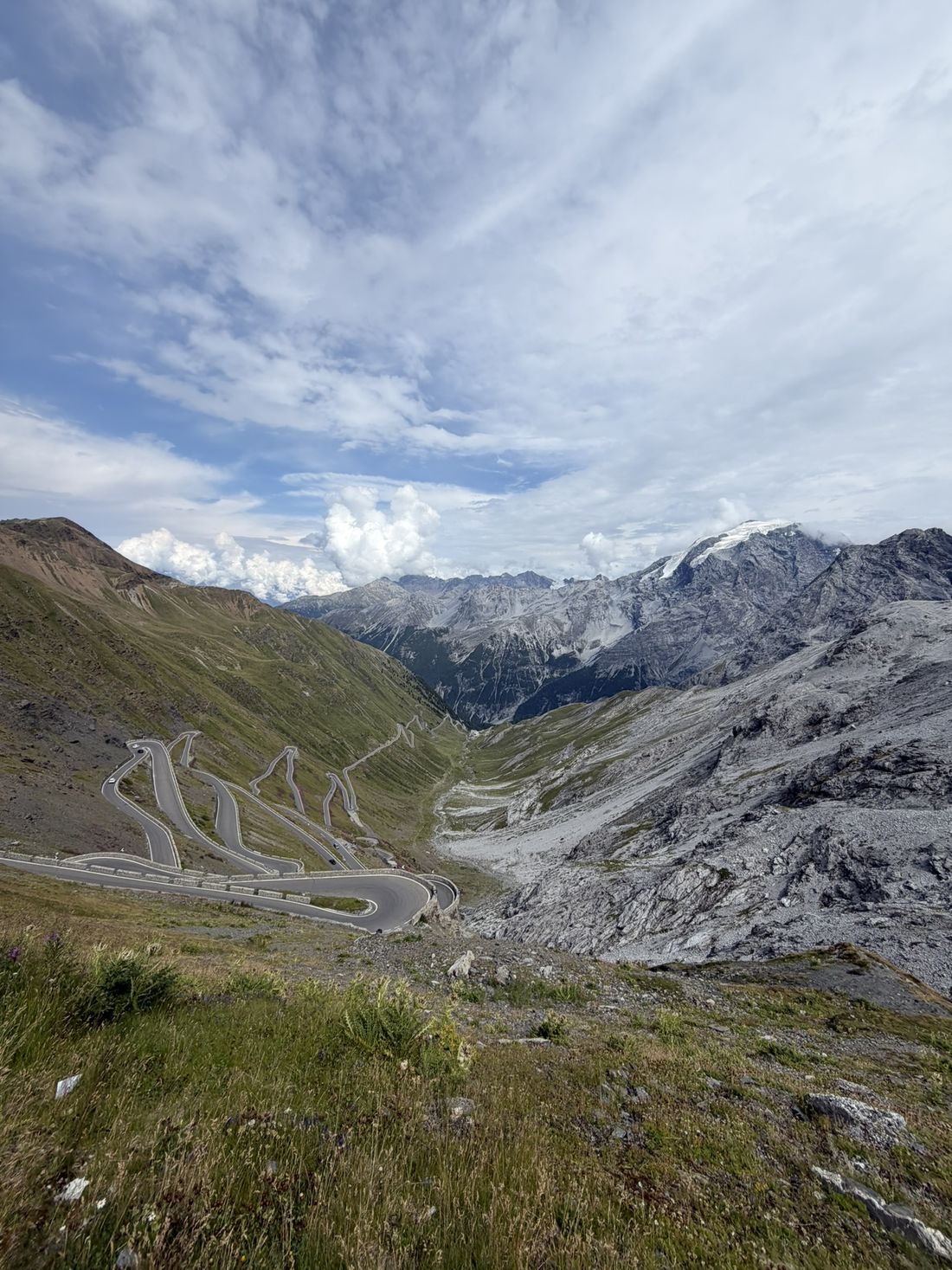 Switchback road climbing a high alpine pass